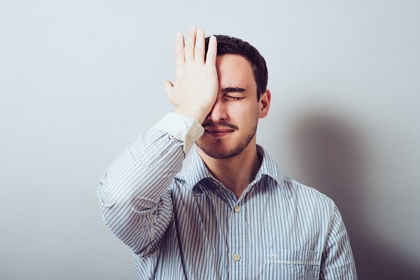 Man smacking face in an "oh, jeez" like fashion